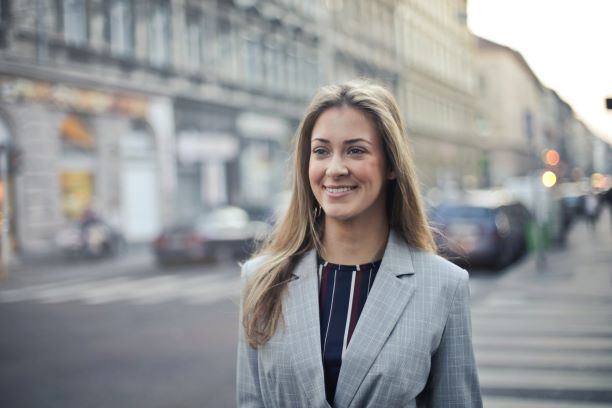 close-up-photography-of-a-woman-wearing-formal-coat-785667